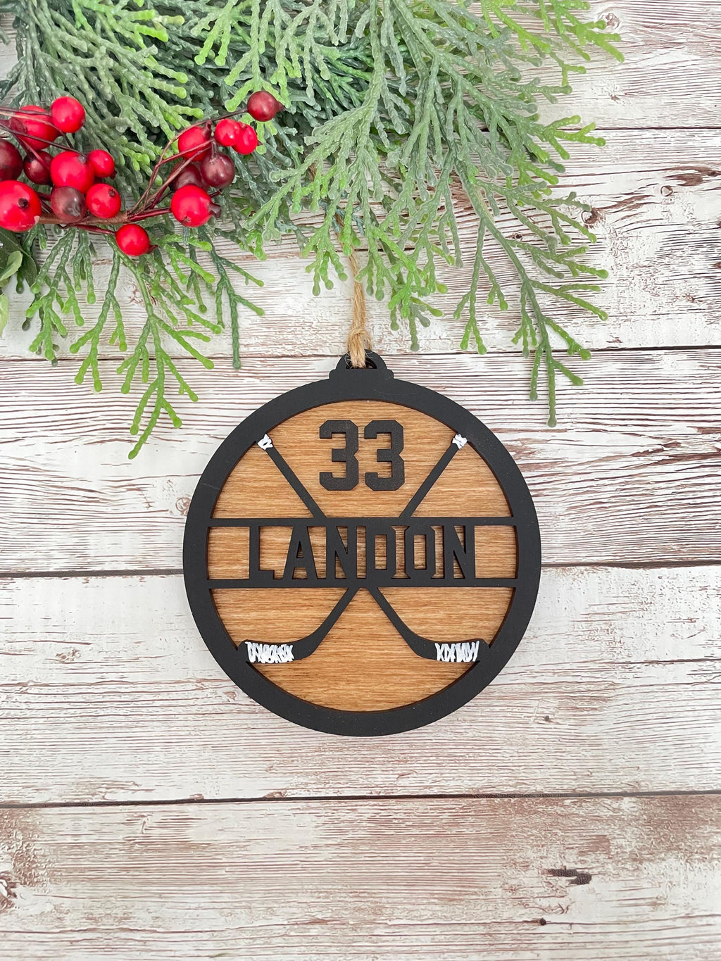 Hockey personalized ornament wood handmade black paint wood stained background twine string to hand sticks hockey team coach manager gift